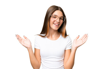 Teenager caucasian girl over isolated background smiling a lot