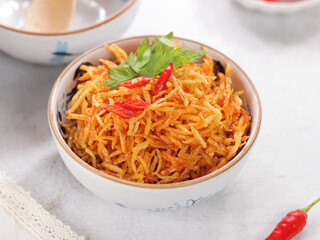 Kentang mustofa, sambal kering kentang or Indonesian cruncy, sweet and spicy potato sticks. It is a side dishes for Opor Ayam (Chicken Curry) and Ketupat or Rice cakes.