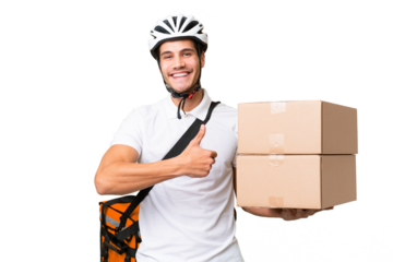 Delivery man wearing a helmet bike over isolated background giving a thumbs up gesture