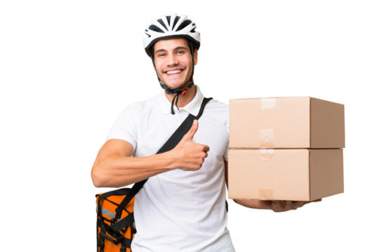Delivery man wearing a helmet bike over isolated background giving a thumbs up gesture
