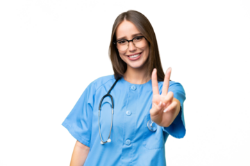 Young nurse caucasian woman over isolated background smiling and showing victory sign