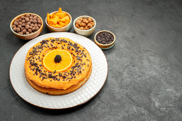front view yummy sweet pie with orange slices on dark grey background pie biscuit dessert sweet cake tea
