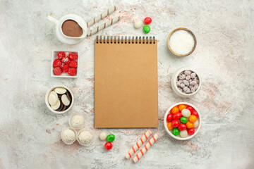 top view colorful candies with cookies on white background color rainbow biscuit tea cake