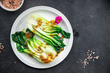 Bok choy or pak choy, Chinese stalked cabbage vegetable dish healthy meal food snack on the table copy space food background rustic top view keto or paleo diet veggie vegan or vegetarian food