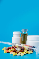 Pharmaceutical preparation, medicine in jars, pills in syringe for injection. Treatment concept