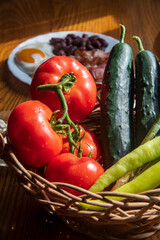 Fried eggs, bacon and beans on a wooden table...vegetable for the breakfast...
