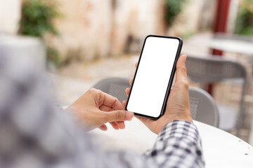 cell phone blank white screen mockup.hand holding texting using mobile on desk at office.background empty space for advertise.work people contact marketing business,technology