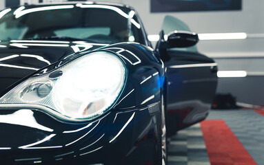 Professional car detailing center - making cars shiny and well maintained. High quality photo