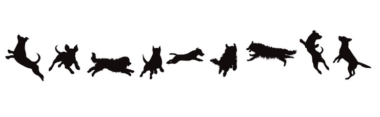 Set of vector silhouette of jumping dogs on white background. - 599587522