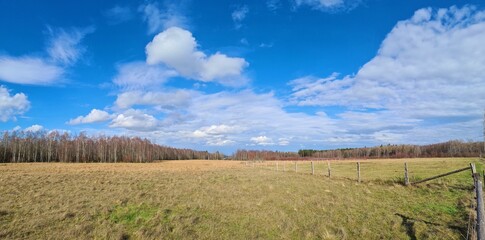 Cloudscape over the scenic landscape in the heathlands of northern Eifel mountains, Germany