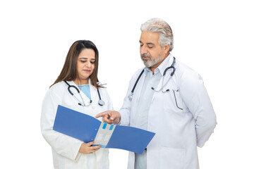 Indian female and male doctor discussing medical report isolated over white background, healthcare concept.