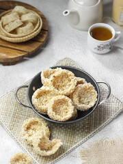 Rengginang Lorjuk is a thick traditional cracker made from round shaped sticky rice. Rengginang Lorjuk is special food from Madura