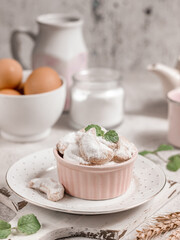 Indonesian Idul Fitri special offerings : Putri Salju or Snow White Cookies. Which is crescent-shaped and coated with powdered sugar covered like snow