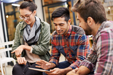 Tablet, people in a meeting at cafe or coffee shop with tablet and talking about startup ideas. Teamwork or collaboration, technology and students or friends together in discussion about project