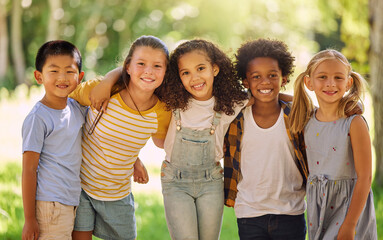 Portrait, friends and children standing in a line together outdoor, feeling happy while having fun or playing. Diversity, school and smile with kids in a row, posing arm around outdoor in a park