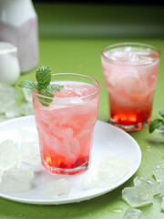 Es Kopyor Jelly or Jelly Syrup Ice which is jelly with the taste of milk or coconut milk which is shaped like a young coconut. Mixed with red syrup, basil seeds, ice cubes. Fresh drinks during Ramadan