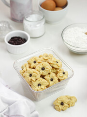 Kue Semprit or Semprit Cookies with chocolate chips on top. These cookies commonly served for Idul Fitri or Lebaran