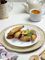 Molen banana is a traditional Indonesian snack, made from processed bananas wrapped in pastry and then deep-fried
