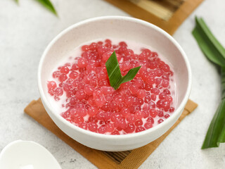 Bubur sagu mutiara, Indonesian dessert, made from sagu mutiara (pearls sago), coconut milk, sugar, pandanus leaves. Very famous during Ramadhan. Iftar food.