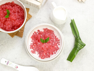 Bubur sagu mutiara, Indonesian dessert, made from sagu mutiara (pearls sago), coconut milk, sugar, pandanus leaves. Very famous during Ramadhan. Iftar food.