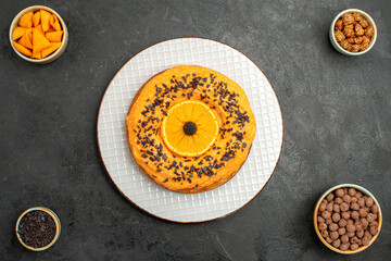 top view delicious sweet pie with orange slices on dark-grey background pie biscuit cake dessert tea cookie