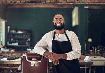 Barber shop, hair stylist and black man portrait of an entrepreneur with a smile. Salon, professional worker and male person face with happiness and proud from small business and beauty parlor - obrazy, fototapety, plakaty