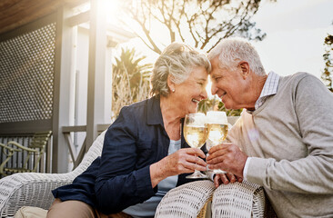 Plakat Love, cheers and wine, old couple celebrate romance or anniversary on patio of vacation home. Happiness, senior man and woman touching heads with champagne toast, smile and romantic date on holiday.