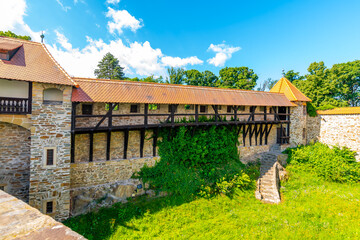 Fototapeta na wymiar Famous medieval castle Bouzov, Czech Republic. National landmark built in 14 century. Famous tourist destination. Summer weather, blue sky.