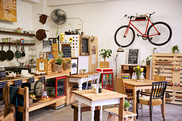 Space, interior and empty coffee shop with table, chairs and furniture or small business, bistro...
