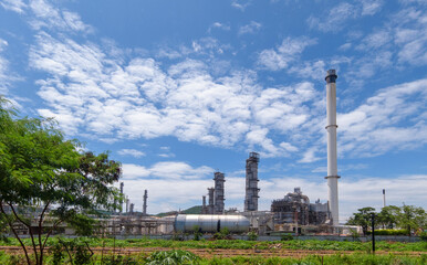 oil refinery plant against blue sky