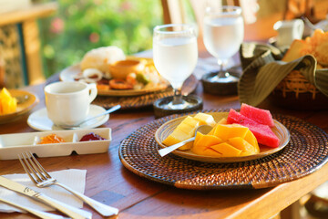 Delicious healthy breakfast with fruit selection and coffee