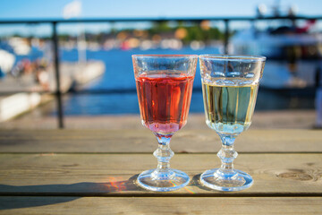 Two glasses of wine in an outdoor cafe