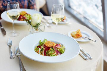 Salad with herbs and smoked duck breast