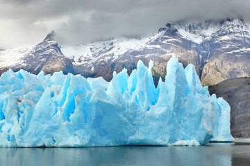 Fototapeta na wymiar Blue icebergs at Grey Glacier in Torres del Paine