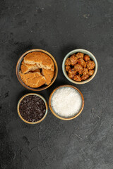 top view sweet nuts with sliced cookies on dark background cookie biscuit candy tea