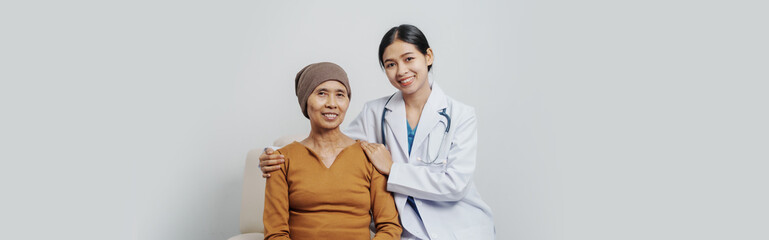 Elderly Asian female patients with cancer specialists meet by appointment to receive treatment...