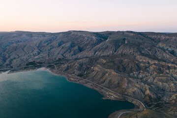 Drone view of amazing mountain ridge with sea water