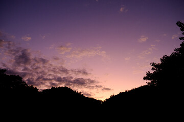 Obraz na płótnie Canvas Magnificent Purple Sunset Mountains Silhouette