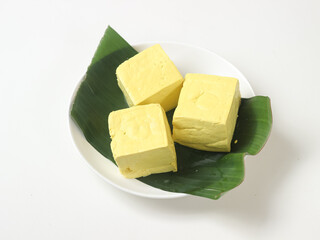 Tahu kuning or raw yellow tofu is one of type traditional food in indonesia made from fermented soybeans