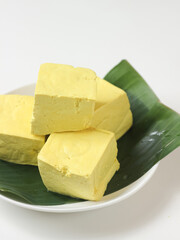 Tahu kuning or raw yellow tofu is one of type traditional food in indonesia made from fermented soybeans