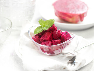 dragon fruit slice in bowl. tropical healthy fruit concept
