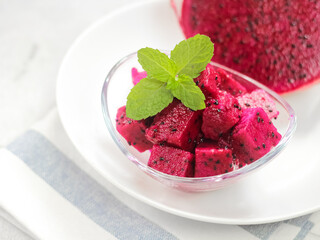 dragon fruit slice in bowl. tropical healthy fruit concept
