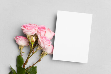 Obraz na płótnie Canvas Wedding invitation card mockup with roses flowers, top view with copy space