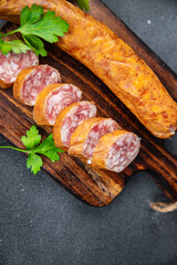 montbeliard sausage meat pork, beef fresh, collagen casing sausage food snack on the table copy space food background rustic top view
