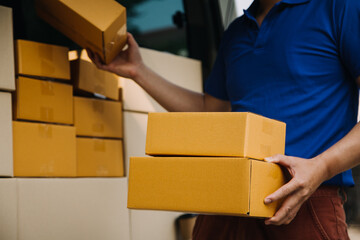 Business woman start up small business entrepreneur SME success .freelance woman working at home with Online Parcel delivery. SME and packaging deliveryconcept