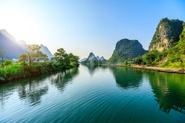 Naklejka premium Landscape of Guilin, Li River and Karst mountains. Located near Yangshuo, Guilin, Guangxi, China.