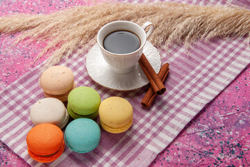 front view cup of tea with cinnamon and macarons on pink desk cake biscuit cookie sweet sugar