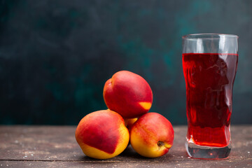 front view fresh peaches with red fruity drink on dark-blue background fruit drink juice mellow fresh - obrazy, fototapety, plakaty