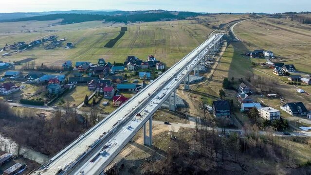 New fragment of highway in construction on Zakopianka road in Poland from Krakow to Zakopane over Klikuszowa village, main place of traffic jams near Nowy Targ. State in March 2023