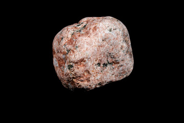 single red stone isolated on black background